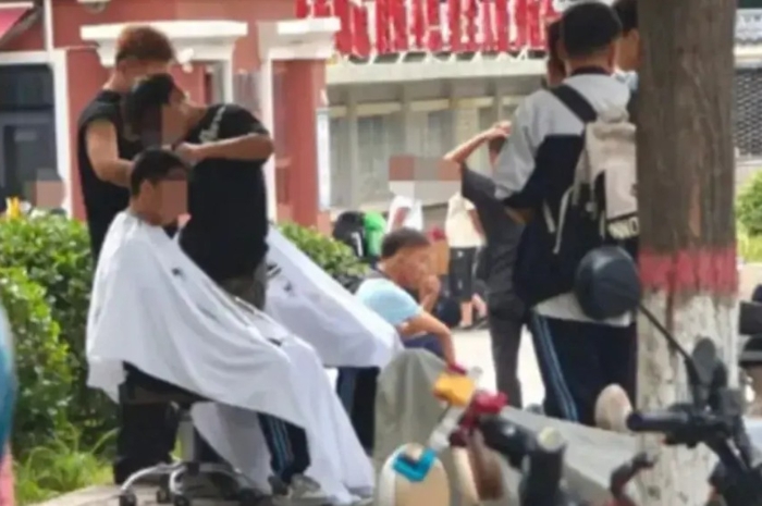 Antrean Tukang Cukur di Gerbang Sekolah China dan Sisi Psikologis di Balik Aturan Ketat